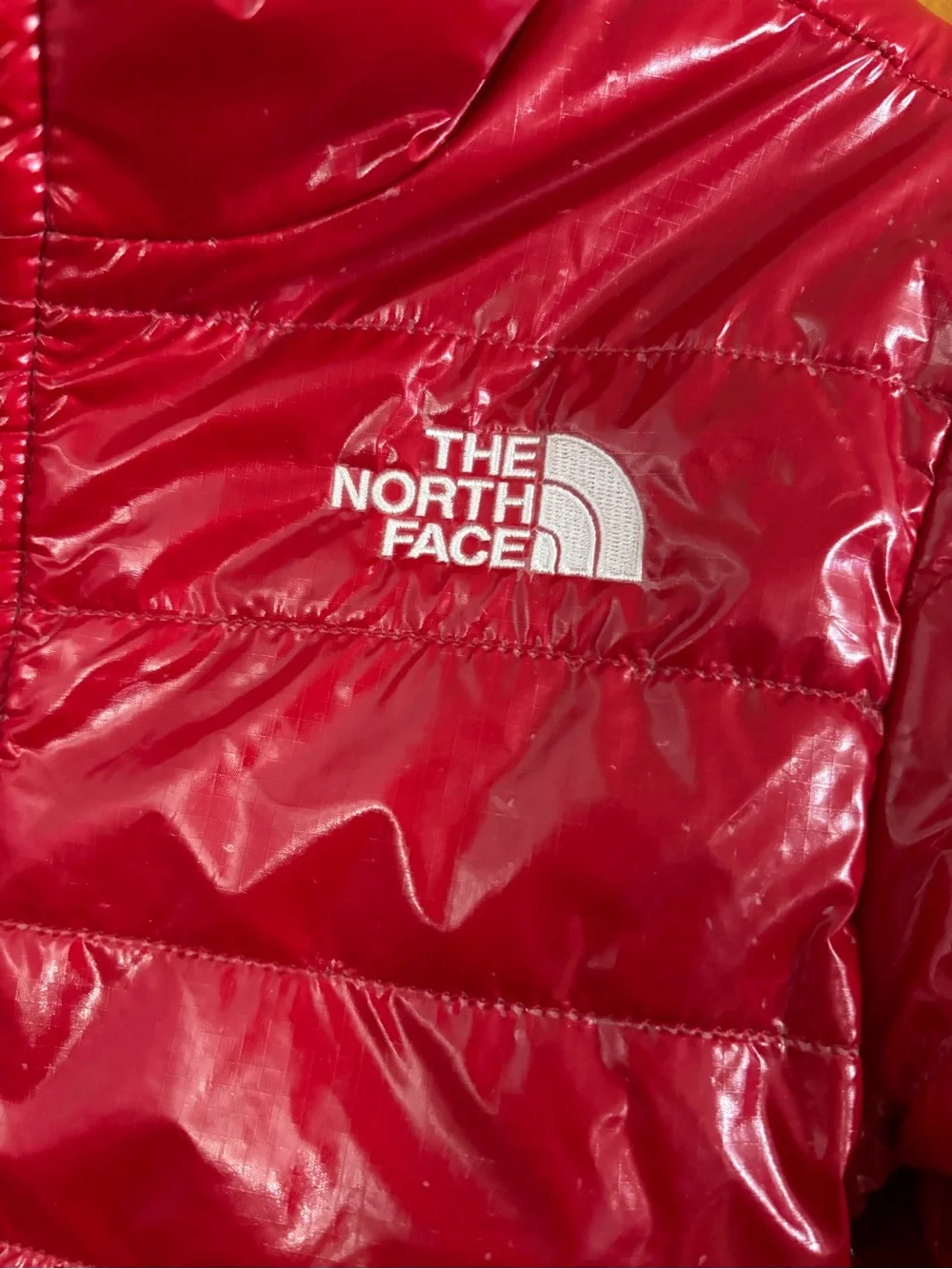 The North Face coat.  Girls. Red reversible